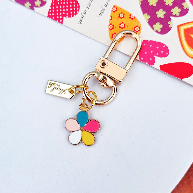 Wholesale Metal Raised Flower Keychains